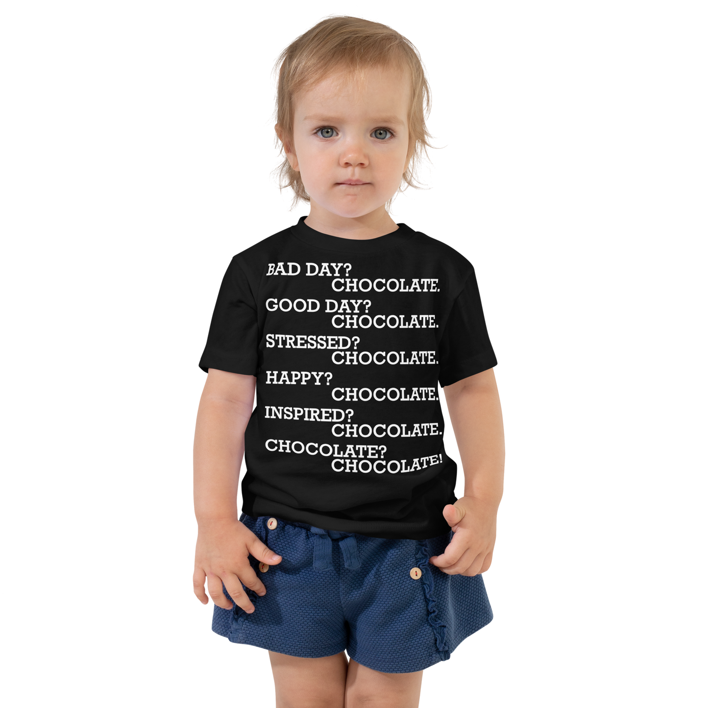 "Bad Day? Chocolate. Good Day? Chocolate. Stressed? Chocolate. Happy? Chocolate. Inspired? Chocolate. Chocolate? Chocolate!" printed on a black toddler short sleeve tee worn by a female