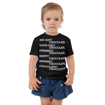 "Bad Day? Chocolate. Good Day? Chocolate. Stressed? Chocolate. Happy? Chocolate. Inspired? Chocolate. Chocolate? Chocolate!" printed on a black toddler short sleeve tee worn by a female