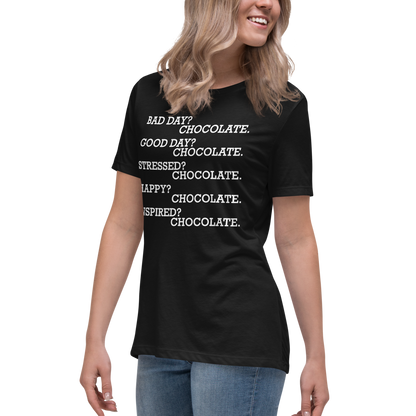 "Bad Day? Chocolate. Good Day? Chocolate. Stressed? Chocolate. Happy? Chocolate. Inspired? Chocolate. Chocolate? Chocolate!" printed on a black women's relaxed t-shirt worn by a female