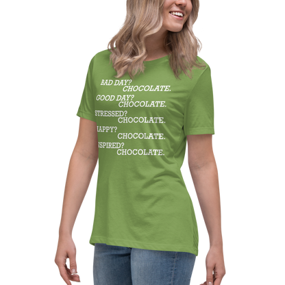 "Bad Day? Chocolate. Good Day? Chocolate. Stressed? Chocolate. Happy? Chocolate. Inspired? Chocolate. Chocolate? Chocolate!" printed on a leaf women's relaxed t-shirt worn by a female