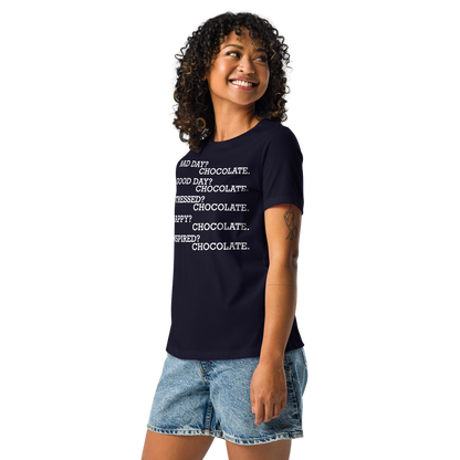"Bad Day? Chocolate. Good Day? Chocolate. Stressed? Chocolate. Happy? Chocolate. Inspired? Chocolate. Chocolate? Chocolate!" printed on a navy women's relaxed t-shirt worn by a female