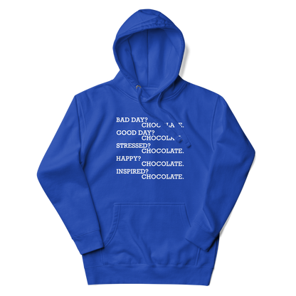 "Bad Day? Chocolate. Good Day? Chocolate. Stressed? Chocolate. Happy? Chocolate. Inspired? Chocolate. Chocolate? Chocolate!" printed on a team royal unisex hoodie laying on a flat surface with the hood up
