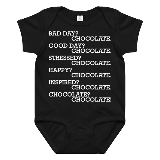 "Bad Day? Chocolate. Good Day? Chocolate. Stressed? Chocolate. Happy? Chocolate. Inspired? Chocolate. Chocolate? Chocolate!" printed on a black baby jersey bodysuit laying on a flat surface amongst other clothes