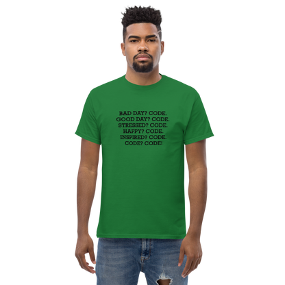"Bad Day? Code. Good Day? Code. Stressed? Code. Happy? Code. Inspired? Code. Code? Code!" printed on a turf green unisex classic tee worn by a male