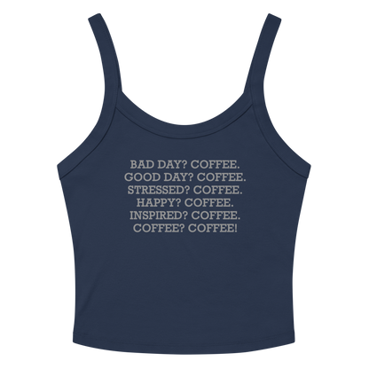 "Bad Day? Coffee. Good Day? Coffee. Stressed? Coffee. Happy? Coffee. Inspired? Coffee. Coffee? Coffee!" printed on a solid navy blend women's micro-rib tanktop laying on a flat surface amongst sunglasses and shorts