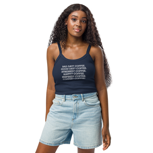 "Bad Day? Coffee. Good Day? Coffee. Stressed? Coffee. Happy? Coffee. Inspired? Coffee. Coffee? Coffee!" printed on a solid navy blend women's micro-rib tanktop worn by a female