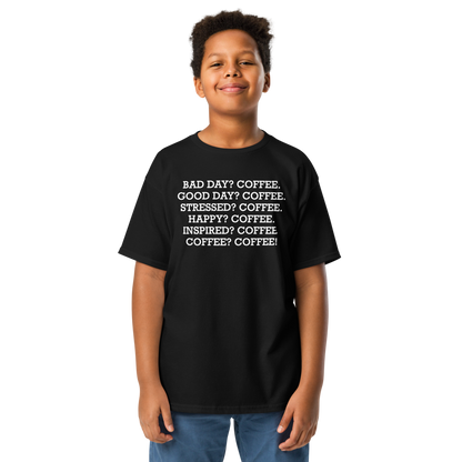 "Bad Day? Coffee. Good Day? Coffee. Stressed? Coffee. Happy? Coffee. Inspired? Coffee. Coffee? Coffee!" printed on a black youth classic tee worn by a male
