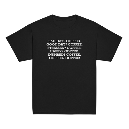 "Bad Day? Coffee. Good Day? Coffee. Stressed? Coffee. Happy? Coffee. Inspired? Coffee. Coffee? Coffee!" printed on a black youth classic tee laying on a flat surface
