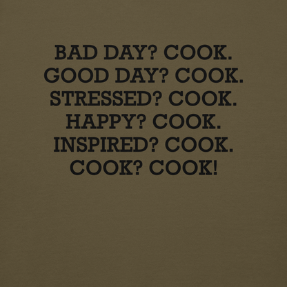 "Bad Day? Cook. Good Day? Cook. Stressed? Cook. Happy? Cook. Inspired? Cook. Cook? Cook!" printed on a military green background