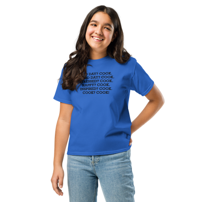 "Bad Day? Cook. Good Day? Cook. Stressed? Cook. Happy? Cook. Inspired? Cook. Cook? Cook!" printed on a royal youth classic tee worn by a female