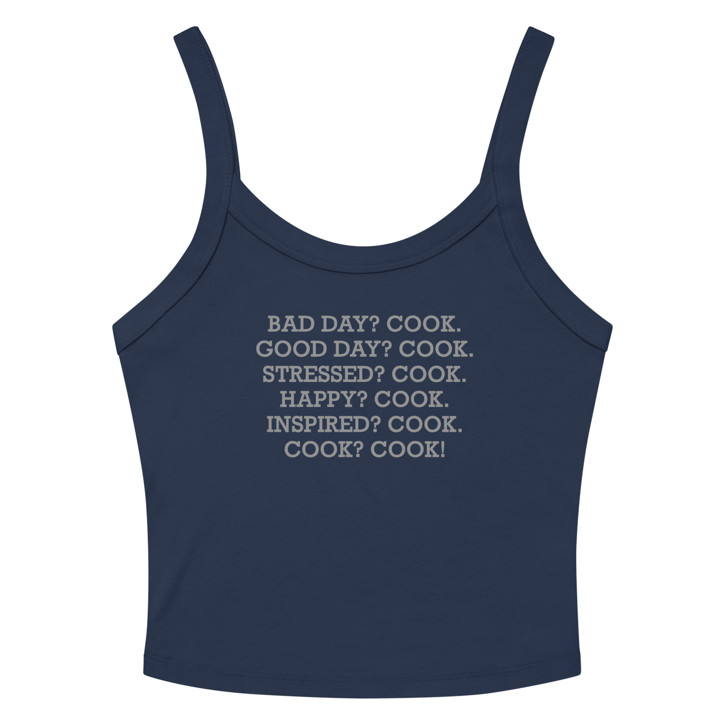 "Bad Day? Cook. Good Day? Cook. Stressed? Cook. Happy? Cook. Inspired? Cook. Cook? Cook!" printed on a solid navy blend women's micro-rib tanktop laying on a flat surface amongst sunglasses and shorts