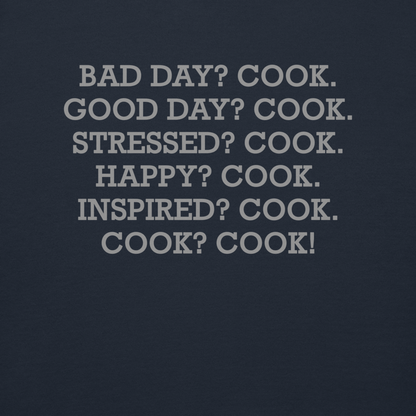 "Bad Day? Cook. Good Day? Cook. Stressed? Cook. Happy? Cook. Inspired? Cook. Cook? Cook!" printed on a navy blazer background
