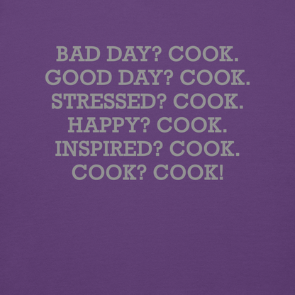 "Bad Day? Cook. Good Day? Cook. Stressed? Cook. Happy? Cook. Inspired? Cook. Cook? Cook!" printed on a purple background