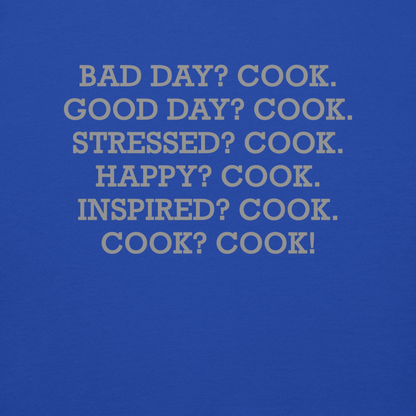 "Bad Day? Cook. Good Day? Cook. Stressed? Cook. Happy? Cook. Inspired? Cook. Cook? Cook!" printed on a team royal background