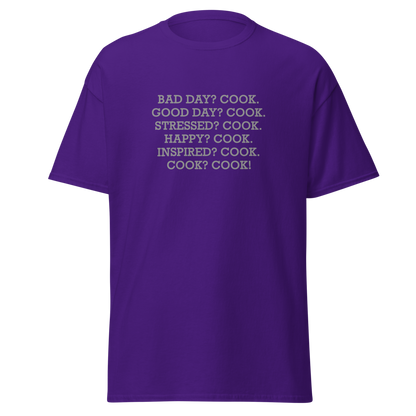 "Bad Day? Cook. Good Day? Cook. Stressed? Cook. Happy? Cook. Inspired? Cook. Cook? Cook!" printed on a purple on an invisible body