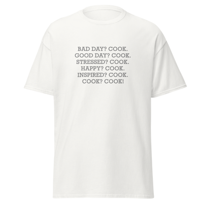 "Bad Day? Cook. Good Day? Cook. Stressed? Cook. Happy? Cook. Inspired? Cook. Cook? Cook!" printed on a white on an invisible body