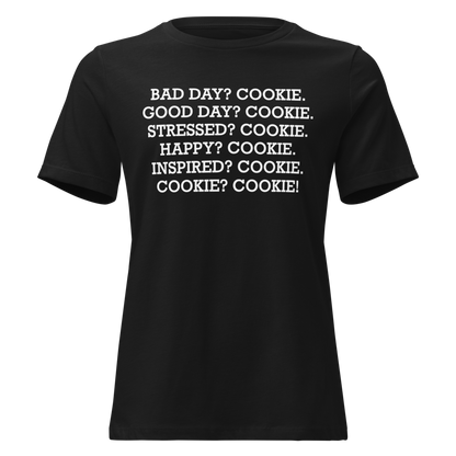 "Bad Day? Cook. Good Day? Cook. Stressed? Cook. Happy? Cook. Inspired? Cook. Cook? Cook!" printed on a black on an invisible / simulated body
