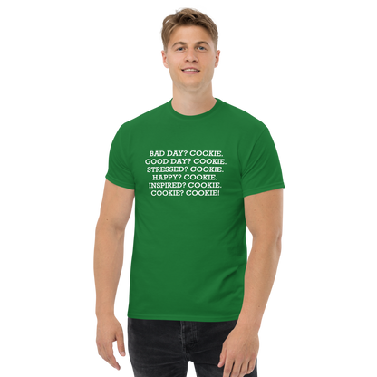 "Bad Day? Cook. Good Day? Cook. Stressed? Cook. Happy? Cook. Inspired? Cook. Cook? Cook!" printed on a turf green unisex classic tee worn by a male