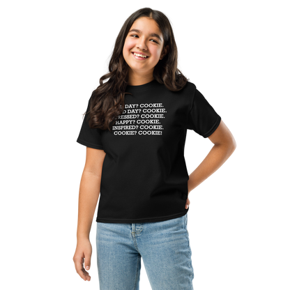 "Bad Day? Cook. Good Day? Cook. Stressed? Cook. Happy? Cook. Inspired? Cook. Cook? Cook!" printed on a black youth classic tee worn by a female