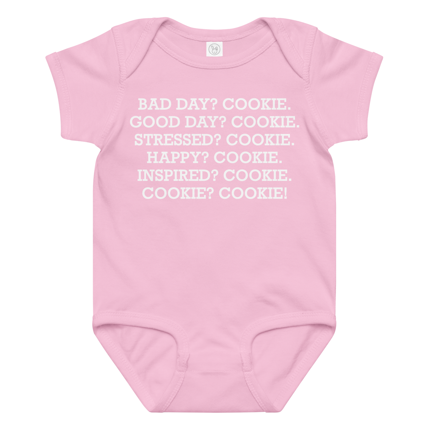 "Bad Day? Cook. Good Day? Cook. Stressed? Cook. Happy? Cook. Inspired? Cook. Cook? Cook!" printed on a pink baby jersey bodysuit laying on a flat surface amongst other clothes