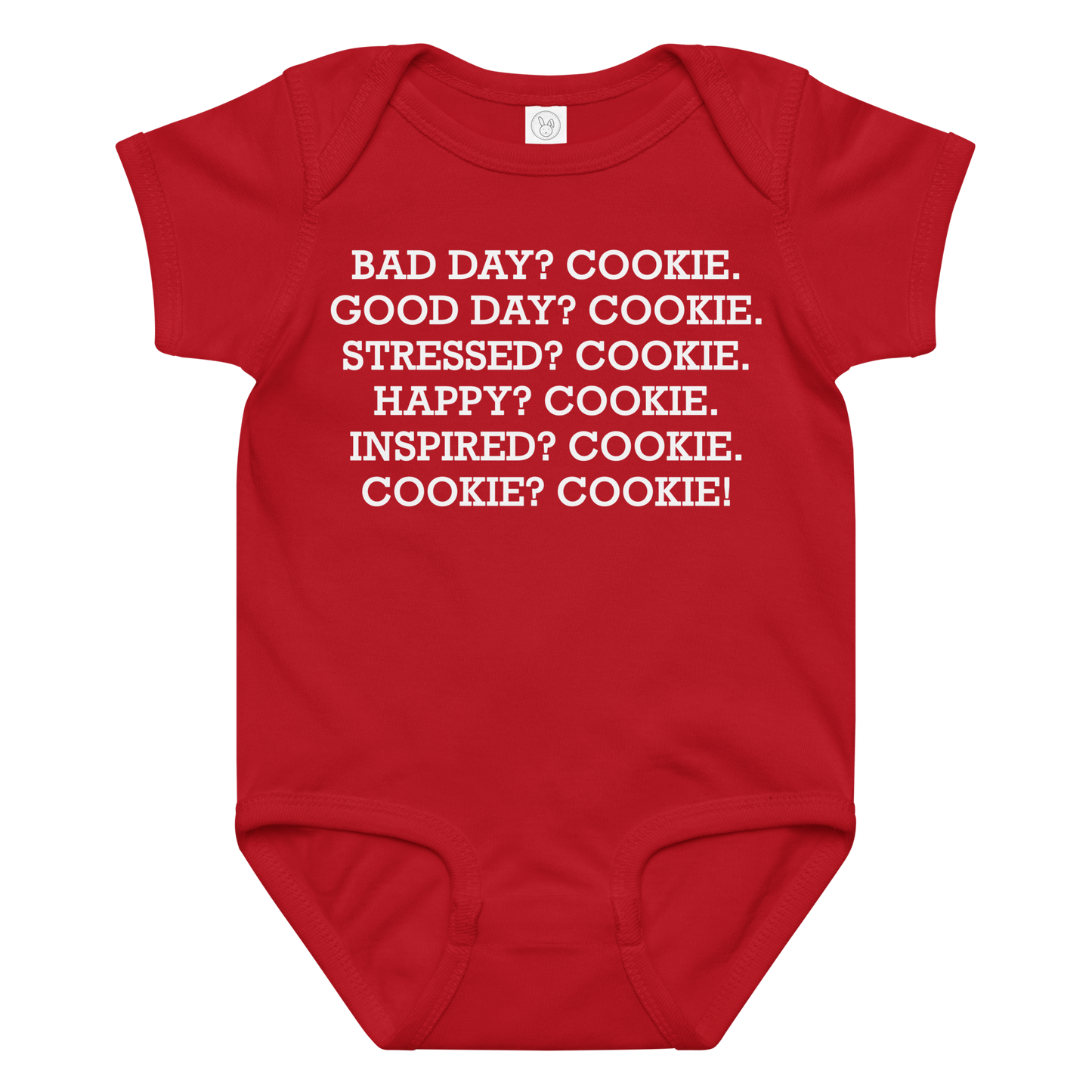 "Bad Day? Cook. Good Day? Cook. Stressed? Cook. Happy? Cook. Inspired? Cook. Cook? Cook!" printed on a red baby jersey bodysuit laying on a flat surface amongst other clothes