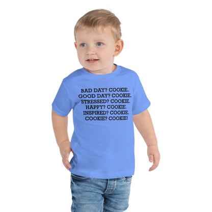 "Bad Day? Cookie. Good Day? Cookie. Stressed? Cookie. Happy? Cookie. Inspired? Cookie. Cookie? Cookie!" printed on a heather columbia blue toddler short sleeve tee worn by a male