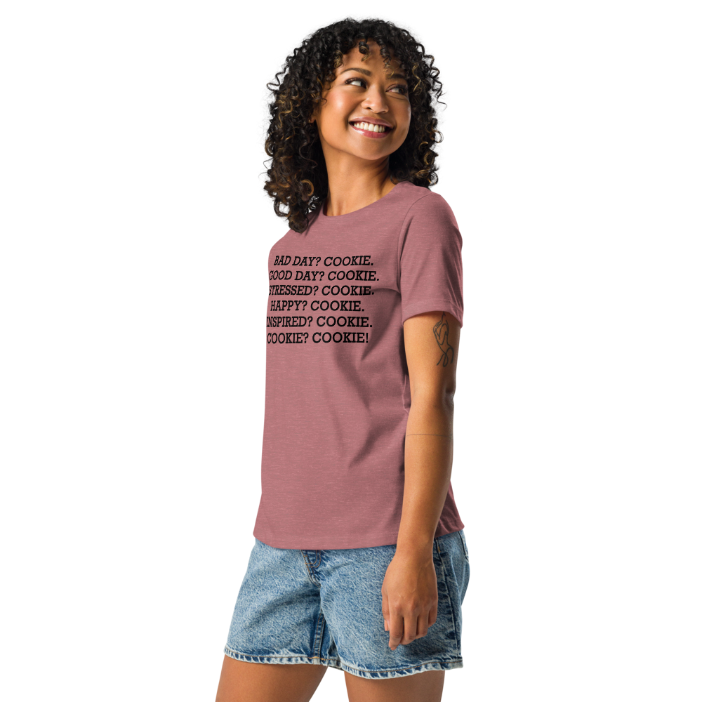 "Bad Day? Cookie. Good Day? Cookie. Stressed? Cookie. Happy? Cookie. Inspired? Cookie. Cookie? Cookie!" printed on a heather mauve women's relaxed t-shirt worn by a female