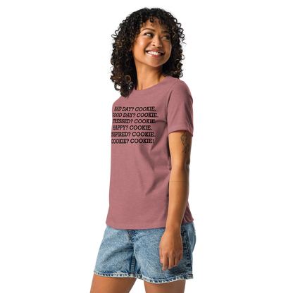 "Bad Day? Cookie. Good Day? Cookie. Stressed? Cookie. Happy? Cookie. Inspired? Cookie. Cookie? Cookie!" printed on a heather mauve women's relaxed t-shirt worn by a female