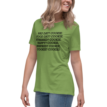 "Bad Day? Cookie. Good Day? Cookie. Stressed? Cookie. Happy? Cookie. Inspired? Cookie. Cookie? Cookie!" printed on a leaf women's relaxed t-shirt worn by a female