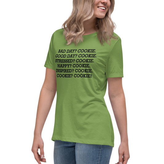 "Bad Day? Cookie. Good Day? Cookie. Stressed? Cookie. Happy? Cookie. Inspired? Cookie. Cookie? Cookie!" printed on a leaf women's relaxed t-shirt worn by a female