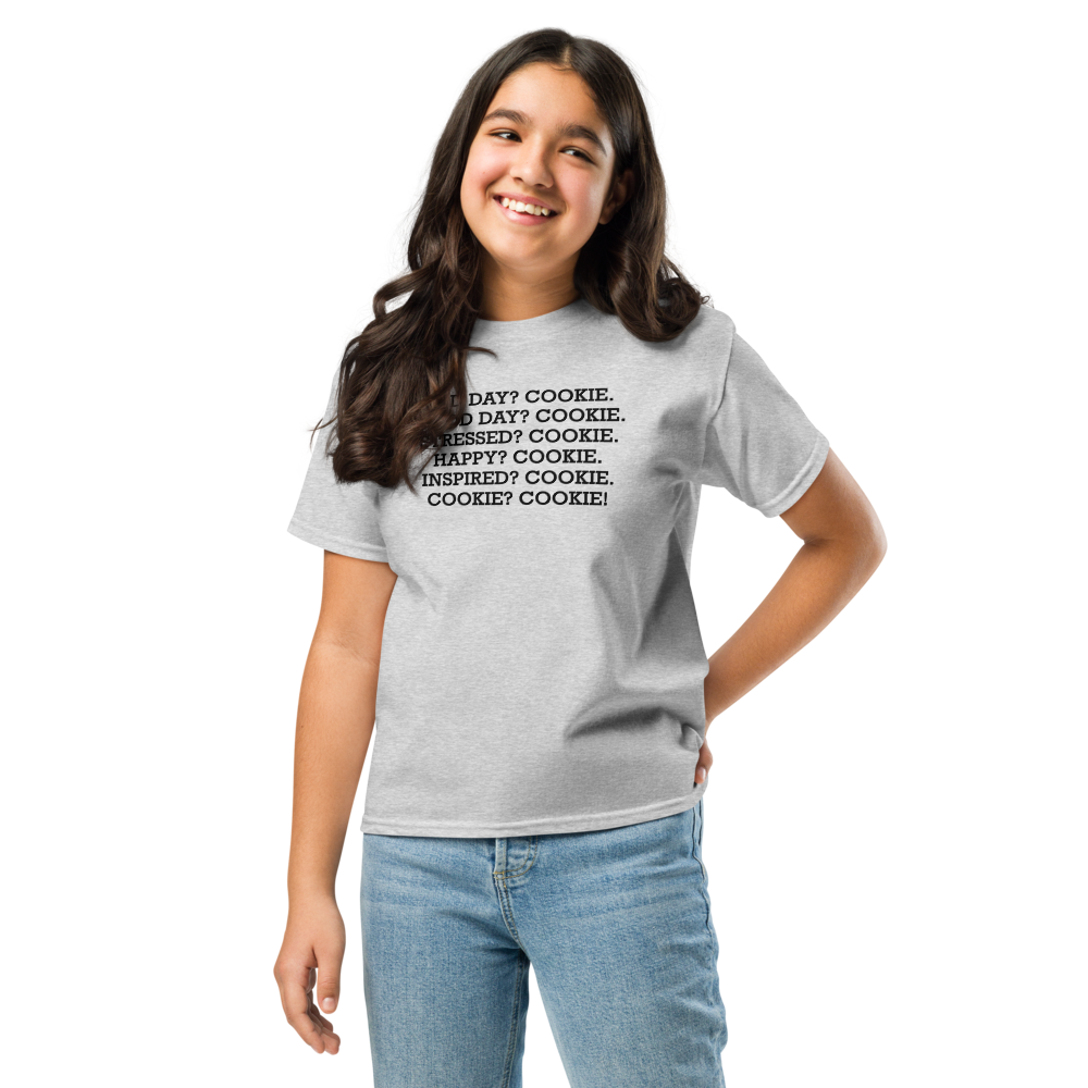 "Bad Day? Cookie. Good Day? Cookie. Stressed? Cookie. Happy? Cookie. Inspired? Cookie. Cookie? Cookie!" printed on a sport grey youth classic tee worn by a female