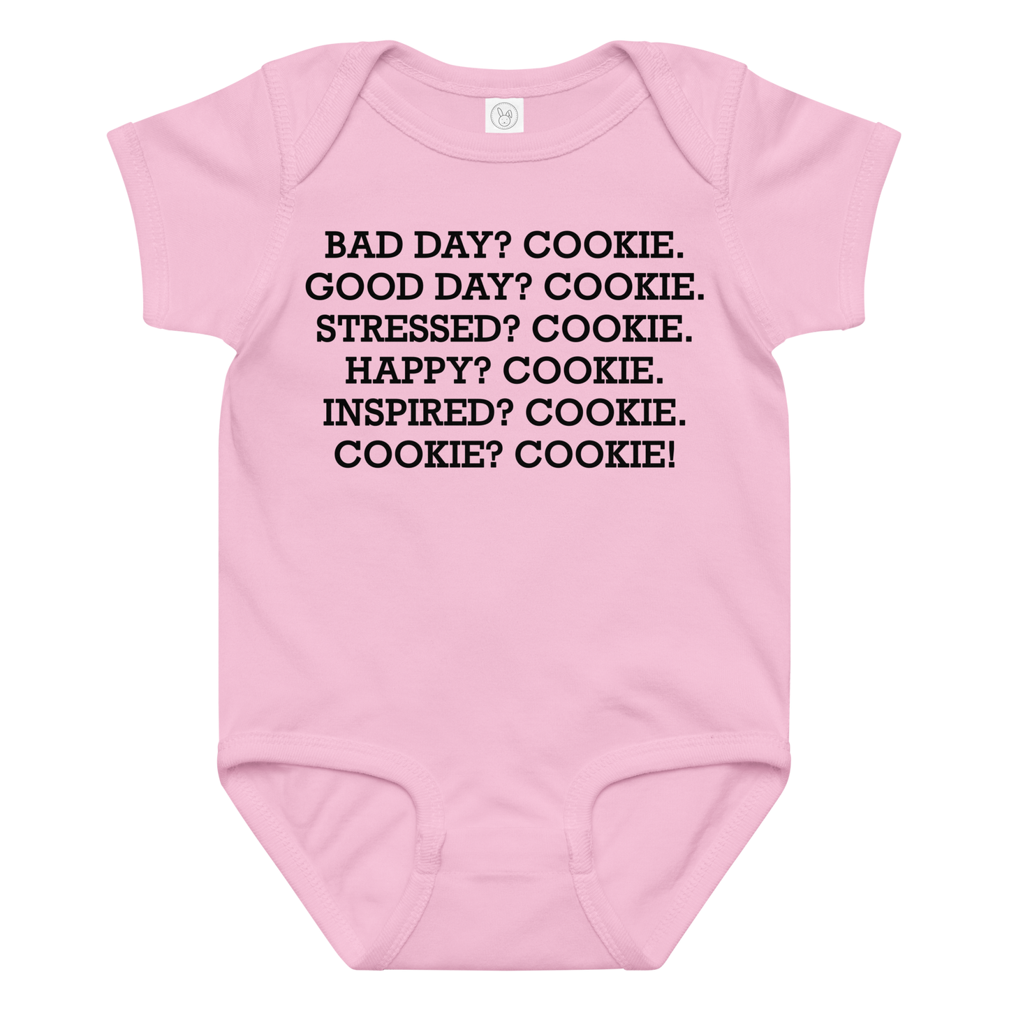 "Bad Day? Cookie. Good Day? Cookie. Stressed? Cookie. Happy? Cookie. Inspired? Cookie. Cookie? Cookie!" printed on a pink baby jersey bodysuit laying on a flat surface amongst other clothes