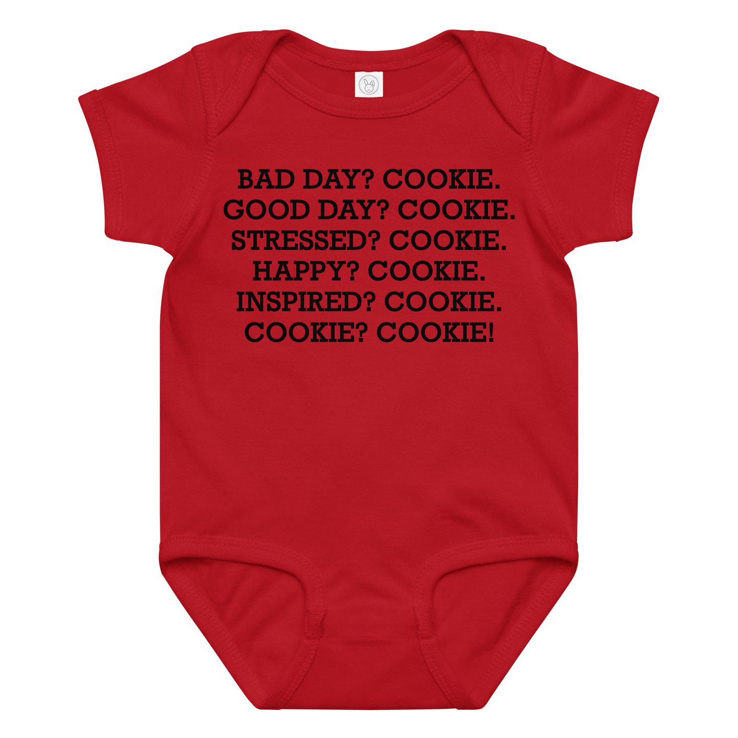 "Bad Day? Cookie. Good Day? Cookie. Stressed? Cookie. Happy? Cookie. Inspired? Cookie. Cookie? Cookie!" printed on a red baby jersey bodysuit laying on a flat surface amongst other clothes