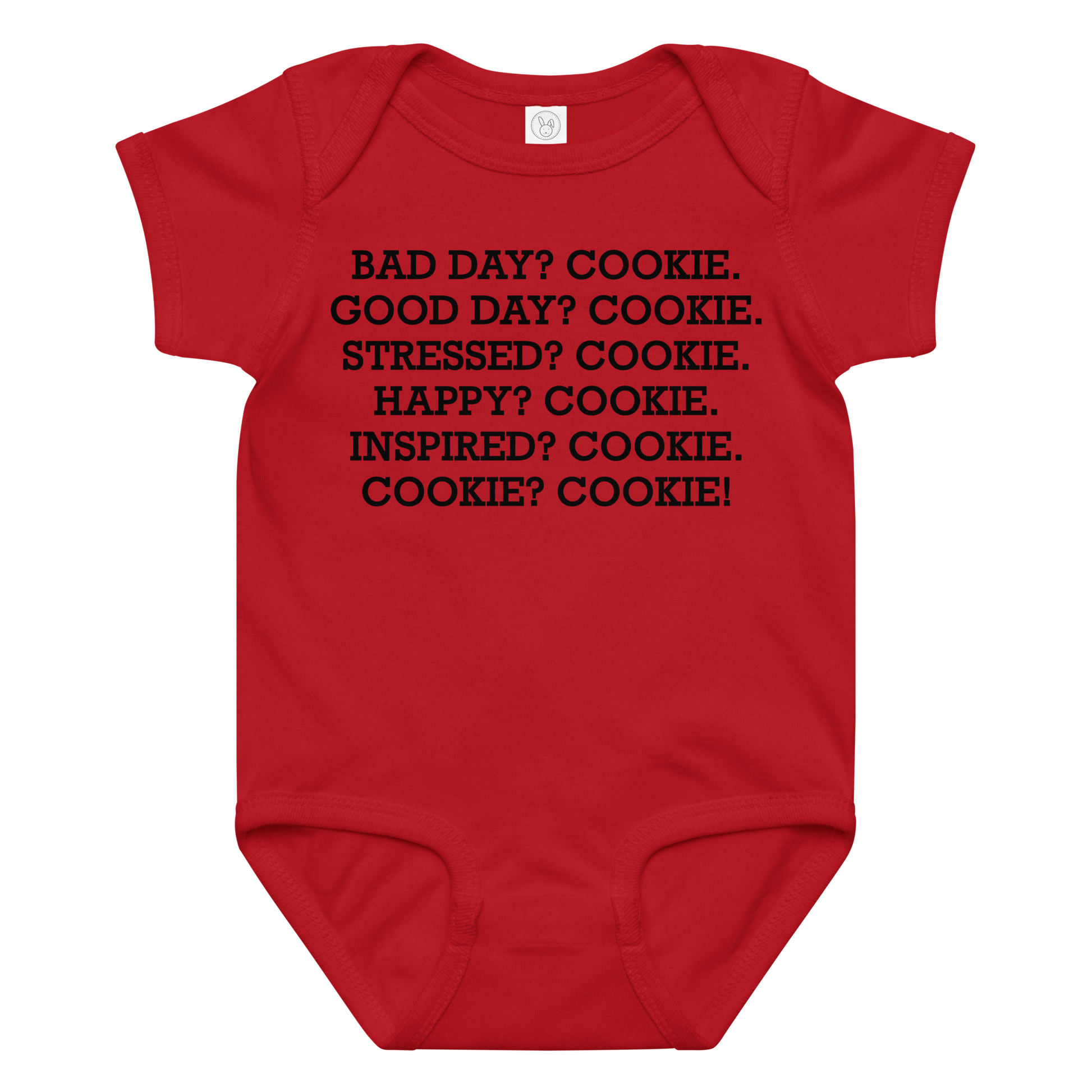 "Bad Day? Cookie. Good Day? Cookie. Stressed? Cookie. Happy? Cookie. Inspired? Cookie. Cookie? Cookie!" printed on a red baby jersey bodysuit laying on a flat surface amongst other clothes