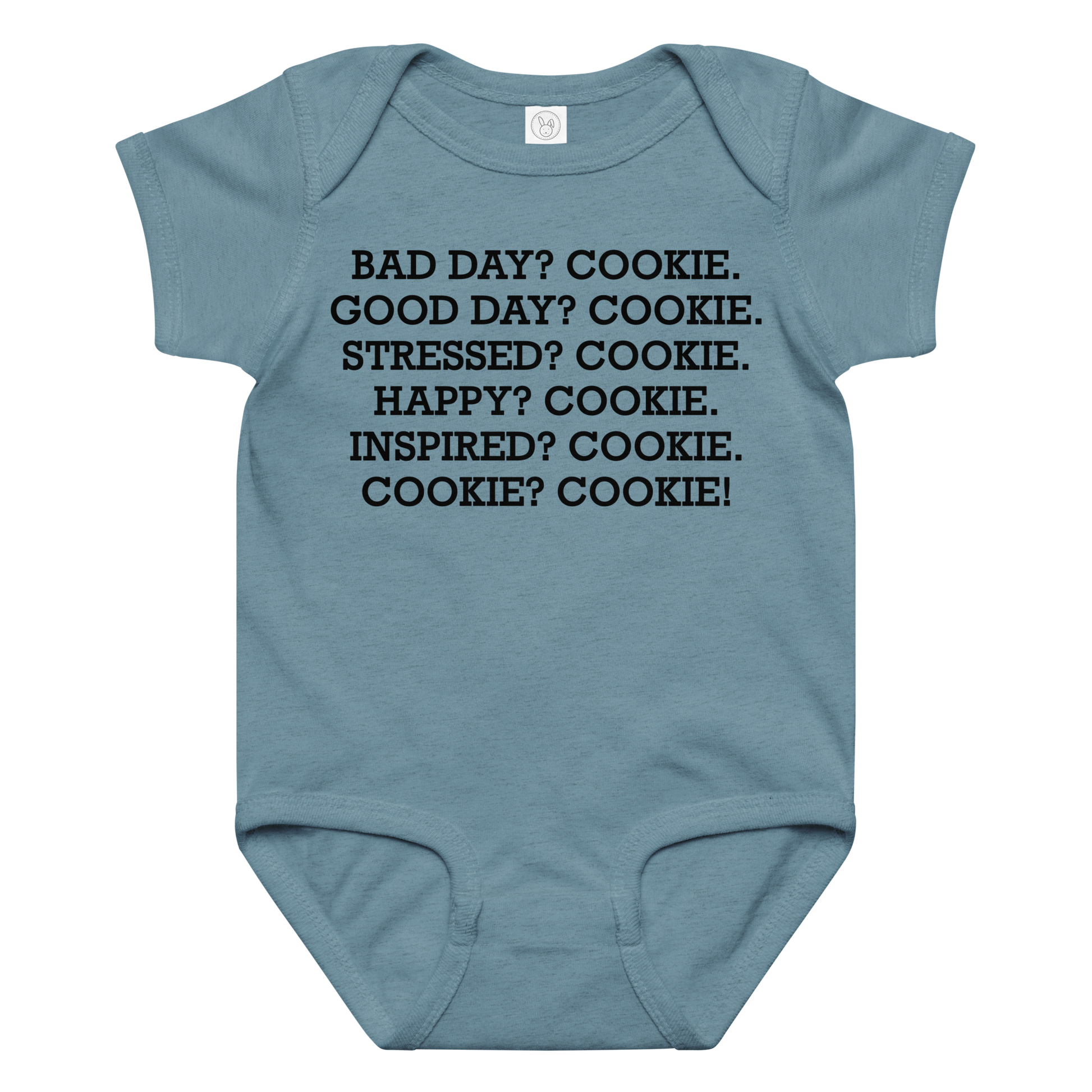 "Bad Day? Cookie. Good Day? Cookie. Stressed? Cookie. Happy? Cookie. Inspired? Cookie. Cookie? Cookie!" printed on a vintage indigo baby jersey bodysuit laying on a flat surface amongst other clothes