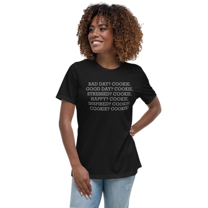"Bad Day? Cookie. Good Day? Cookie. Stressed? Cookie. Happy? Cookie. Inspired? Cookie. Cookie? Cookie!" printed on a black women's relaxed t-shirt worn by a female