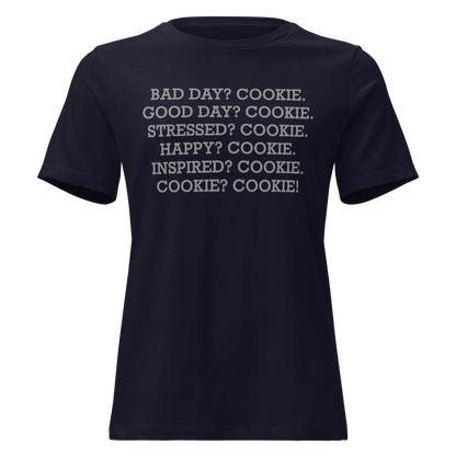 "Bad Day? Cookie. Good Day? Cookie. Stressed? Cookie. Happy? Cookie. Inspired? Cookie. Cookie? Cookie!" printed on a navy on an invisible / simulated body