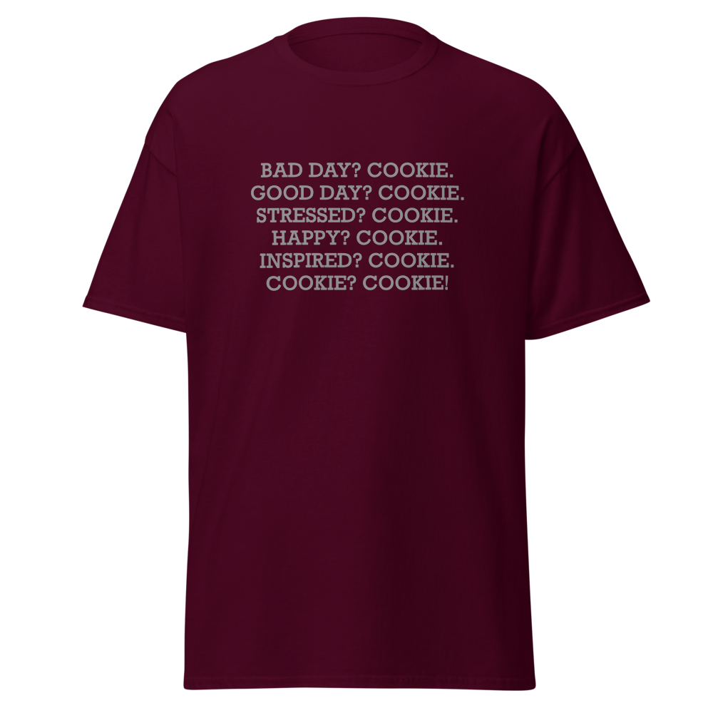 "Bad Day? Cookie. Good Day? Cookie. Stressed? Cookie. Happy? Cookie. Inspired? Cookie. Cookie? Cookie!" printed on a maroon on an invisible body
