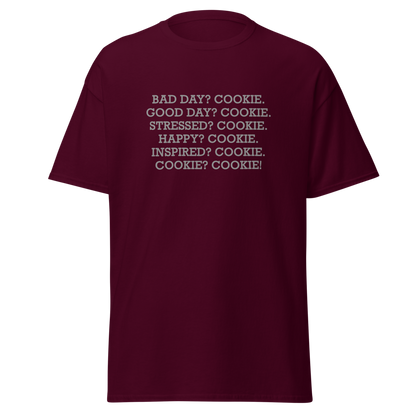 "Bad Day? Cookie. Good Day? Cookie. Stressed? Cookie. Happy? Cookie. Inspired? Cookie. Cookie? Cookie!" printed on a maroon on an invisible body