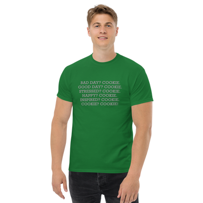 "Bad Day? Cookie. Good Day? Cookie. Stressed? Cookie. Happy? Cookie. Inspired? Cookie. Cookie? Cookie!" printed on a turf green unisex classic tee worn by a male