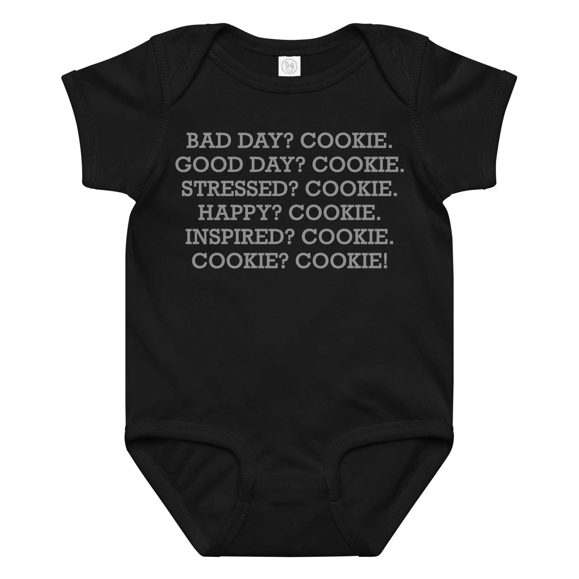 "Bad Day? Cookie. Good Day? Cookie. Stressed? Cookie. Happy? Cookie. Inspired? Cookie. Cookie? Cookie!" printed on a black baby jersey bodysuit laying on a flat surface amongst other clothes
