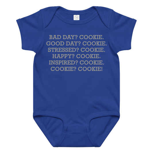"Bad Day? Cookie. Good Day? Cookie. Stressed? Cookie. Happy? Cookie. Inspired? Cookie. Cookie? Cookie!" printed on a royal baby jersey bodysuit laying on a flat surface amongst other clothes