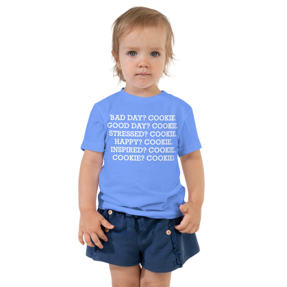 "Bad Day? Cookie. Good Day? Cookie. Stressed? Cookie. Happy? Cookie. Inspired? Cookie. Cookie? Cookie!" printed on a heather columbia blue toddler short sleeve tee worn by a female