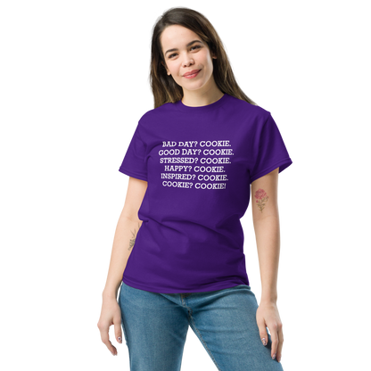"Bad Day? Cookie. Good Day? Cookie. Stressed? Cookie. Happy? Cookie. Inspired? Cookie. Cookie? Cookie!" printed on a purple unisex classic tee worn by a female
