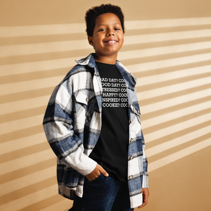 "Bad Day? Cookie. Good Day? Cookie. Stressed? Cookie. Happy? Cookie. Inspired? Cookie. Cookie? Cookie!" printed on a black youth classic tee worn by a male also wearing a jacket