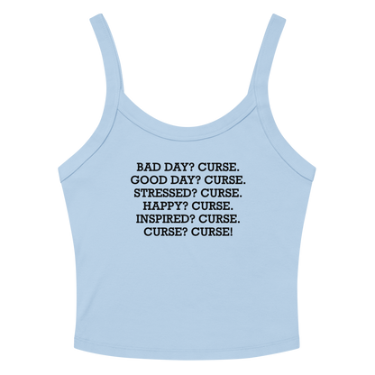 "Bad Day? Curse. Good Day? Curse. Stressed? Curse. Happy? Curse. Inspired? Curse. Curse? Curse!" printed on a solid baby blue blend women's micro-rib tanktop laying on a flat surface amongst sunglasses and shorts