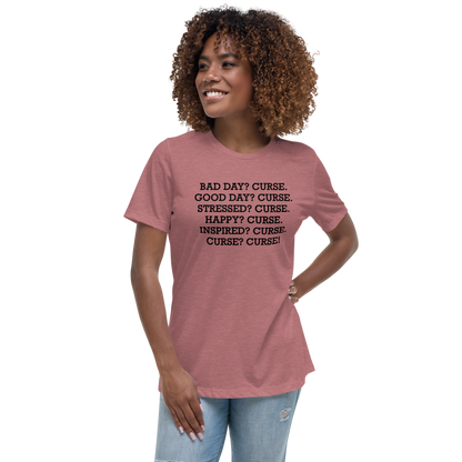 "Bad Day? Curse. Good Day? Curse. Stressed? Curse. Happy? Curse. Inspired? Curse. Curse? Curse!" printed on a heather mauve women's relaxed t-shirt worn by a female