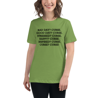 "Bad Day? Curse. Good Day? Curse. Stressed? Curse. Happy? Curse. Inspired? Curse. Curse? Curse!" printed on a leaf women's relaxed t-shirt worn by a female