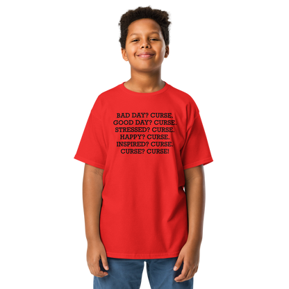 "Bad Day? Curse. Good Day? Curse. Stressed? Curse. Happy? Curse. Inspired? Curse. Curse? Curse!" printed on a red youth classic tee worn by a male