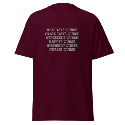 "Bad Day? Curse. Good Day? Curse. Stressed? Curse. Happy? Curse. Inspired? Curse. Curse? Curse!" printed on a maroon on an invisible body